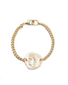 Gold Coin with Gold Curb Chain Bracelet and Lobster Clasp on White Background 