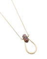 A gold-plated brass necklace with a pinched 'U' shaped rhodochrosite point and a rolo chain.