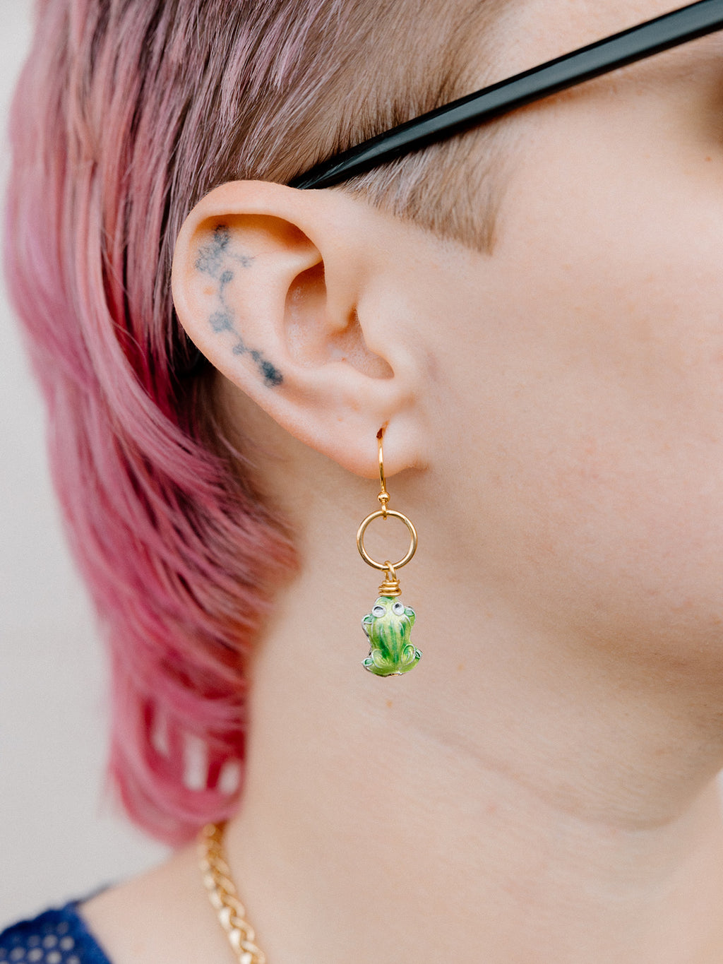 Model Wearing “Lucky” Frog Earring With Gold Ring and Hook