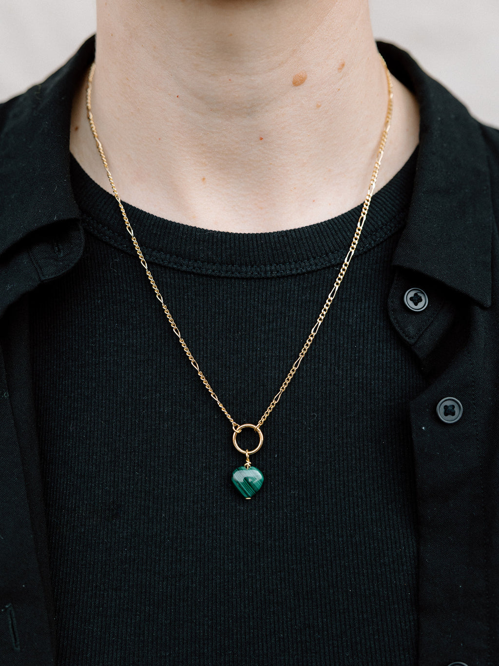 Model Wearing Malachite Heart Necklace With Gold Ring and Chain