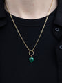 Closer Up Image Of Model Wearing Malachite Heart Necklace With Gold Ring and Chain