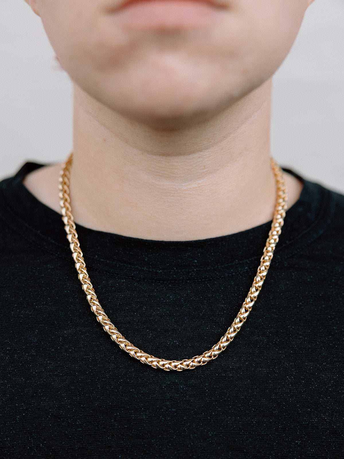 Model Wearing Shiny Gold Plated Snake Chain Necklace