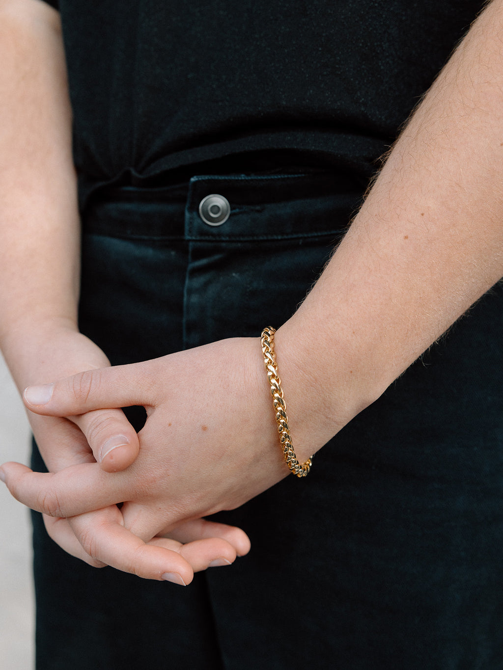 Model Wearing Shiny Gold Plated Snake Chain Bracelet