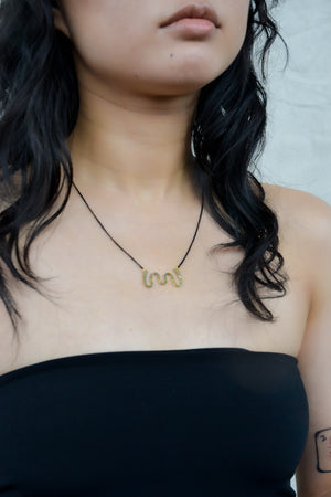 Brass Swiggle Necklace on Black Chain