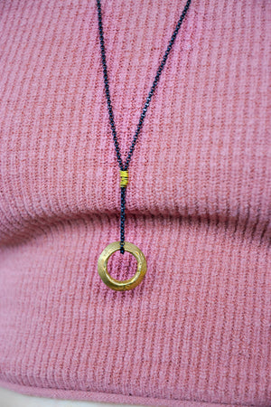 Golden Ethiopian Ring Necklace on Black Chain